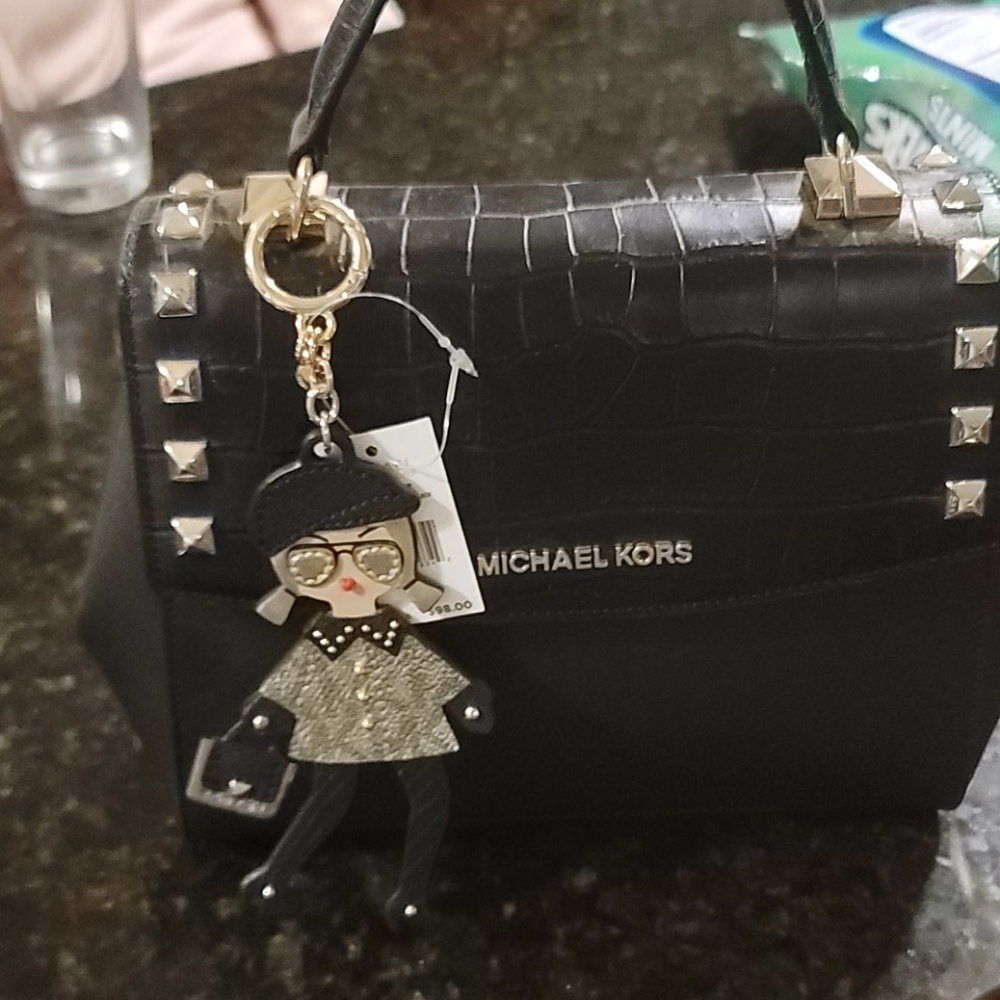 Michael Kors stud bag only.